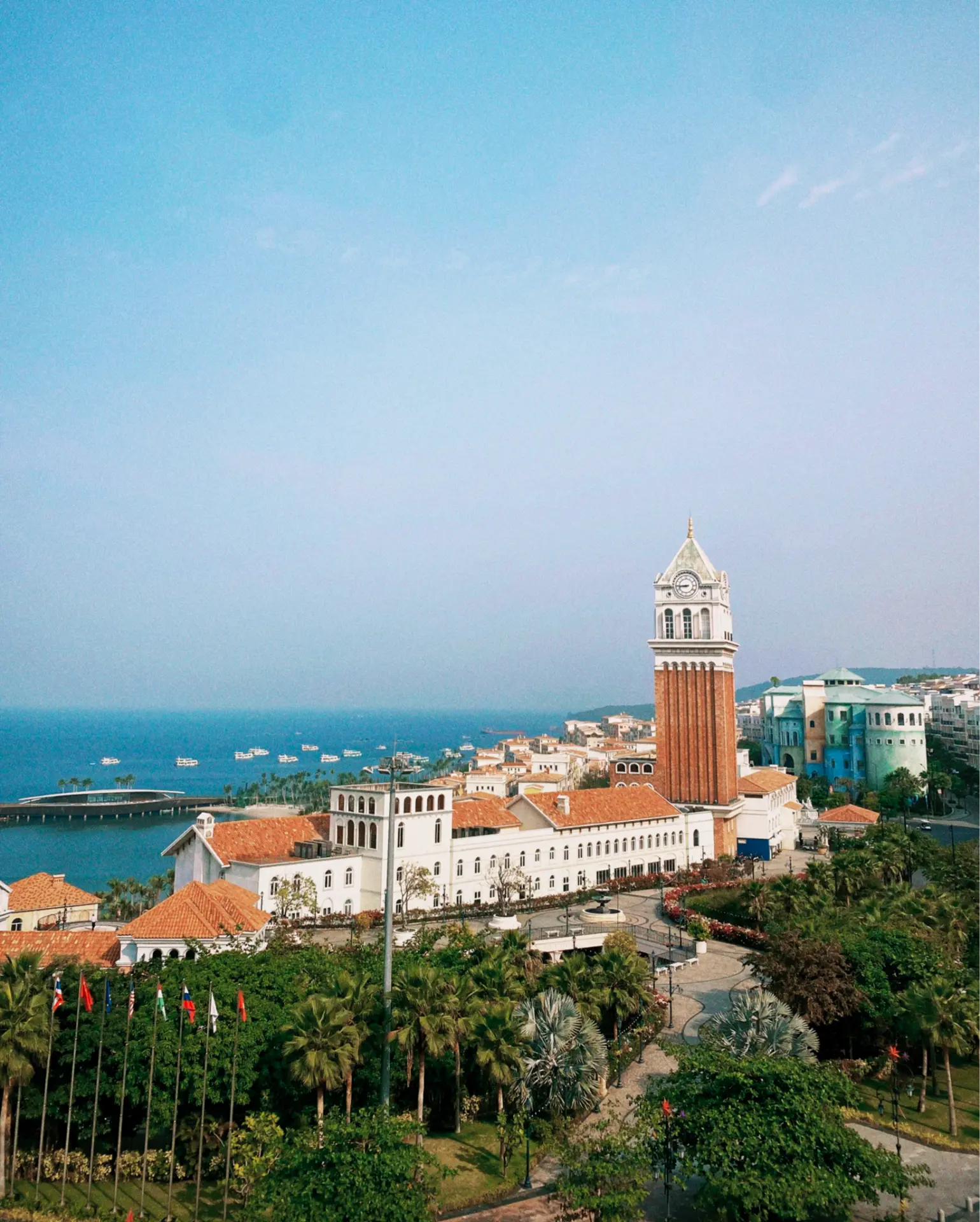 Coastal town with a brick clock tower overlooking the sea