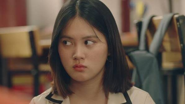 Don't Touch My Gang series still — a girl pouting in a classroom